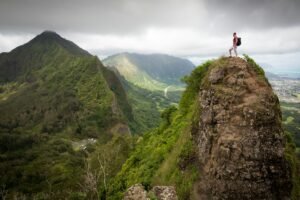 Man standing on a mountain peak