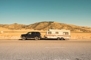 Car pulling a trailer